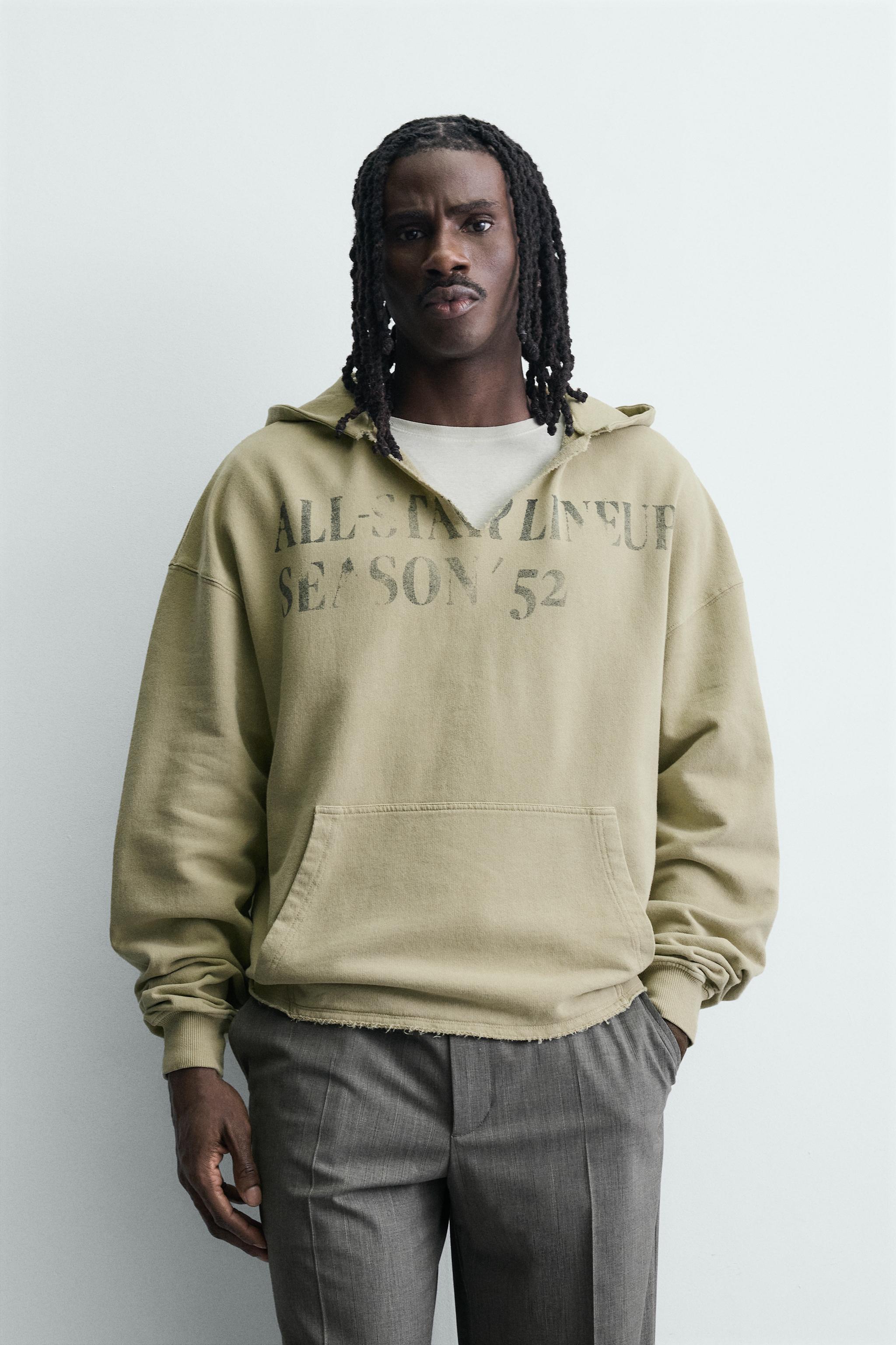 WASHED PRINTED TEXT SWEATSHIRT
